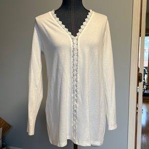 Winter white tunic size medium lace detail around the neck and down center